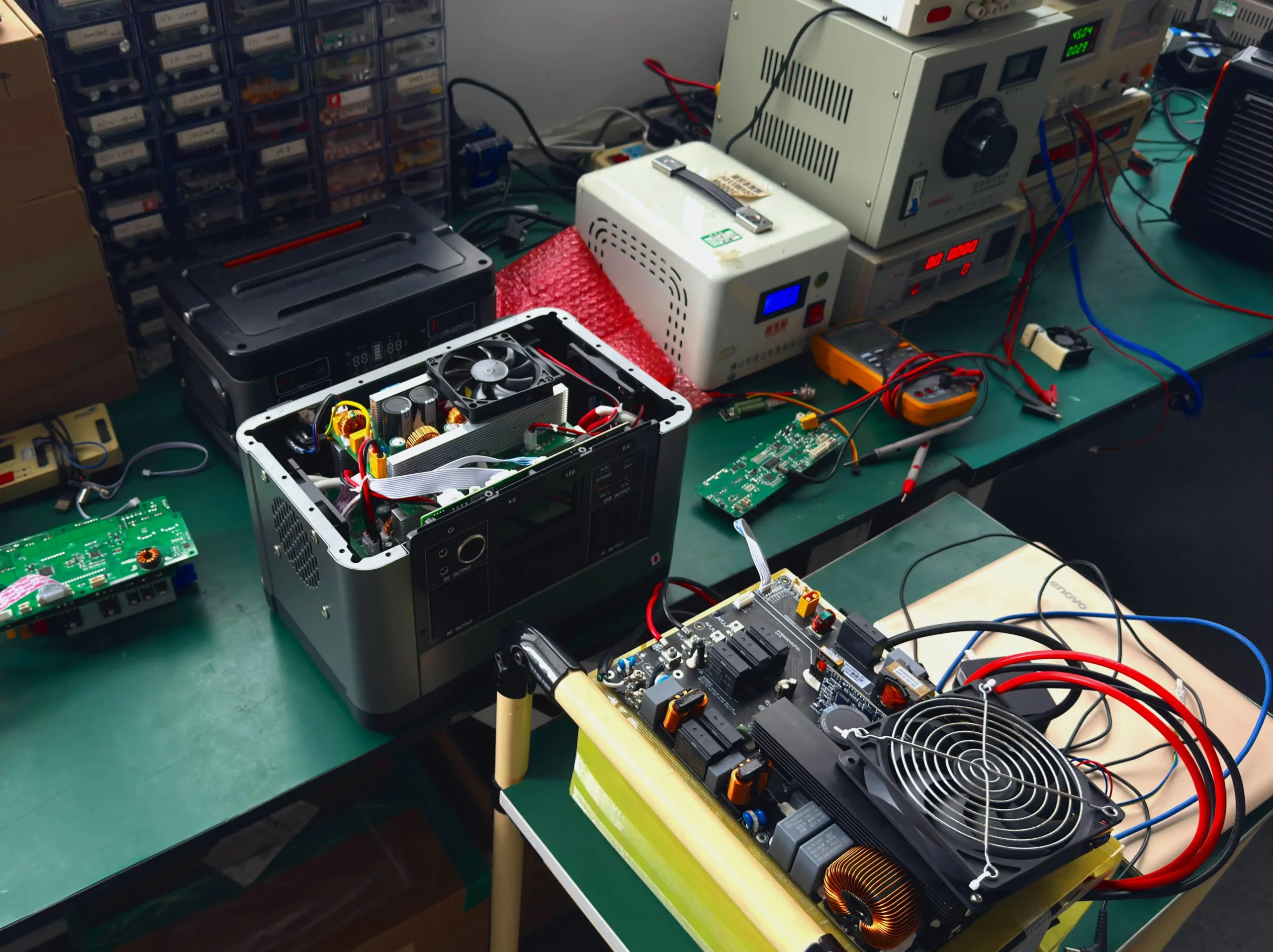 Portable power station sample undergoing technical evaluation and component testing