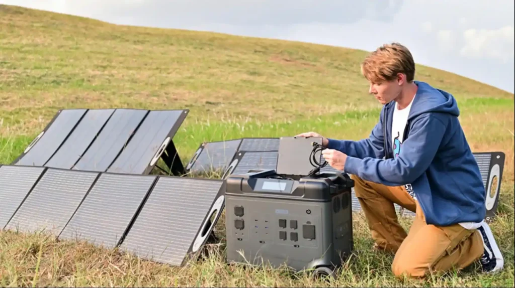 Solar panel connected to a portable power station for outdoor energy use