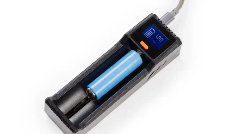 18650 lithium-ion battery charging safely in a dedicated charger with voltage and current monitoring.